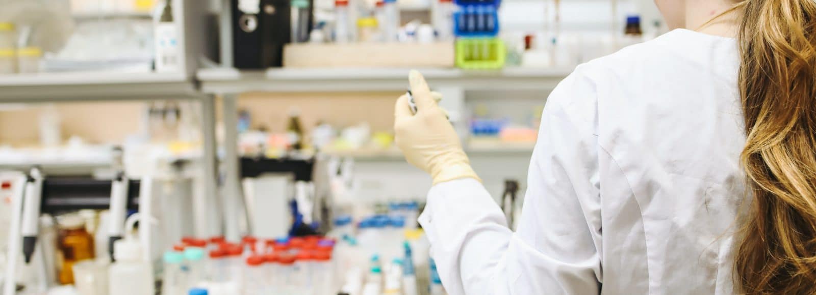 woman-in-white-laboratory-gown